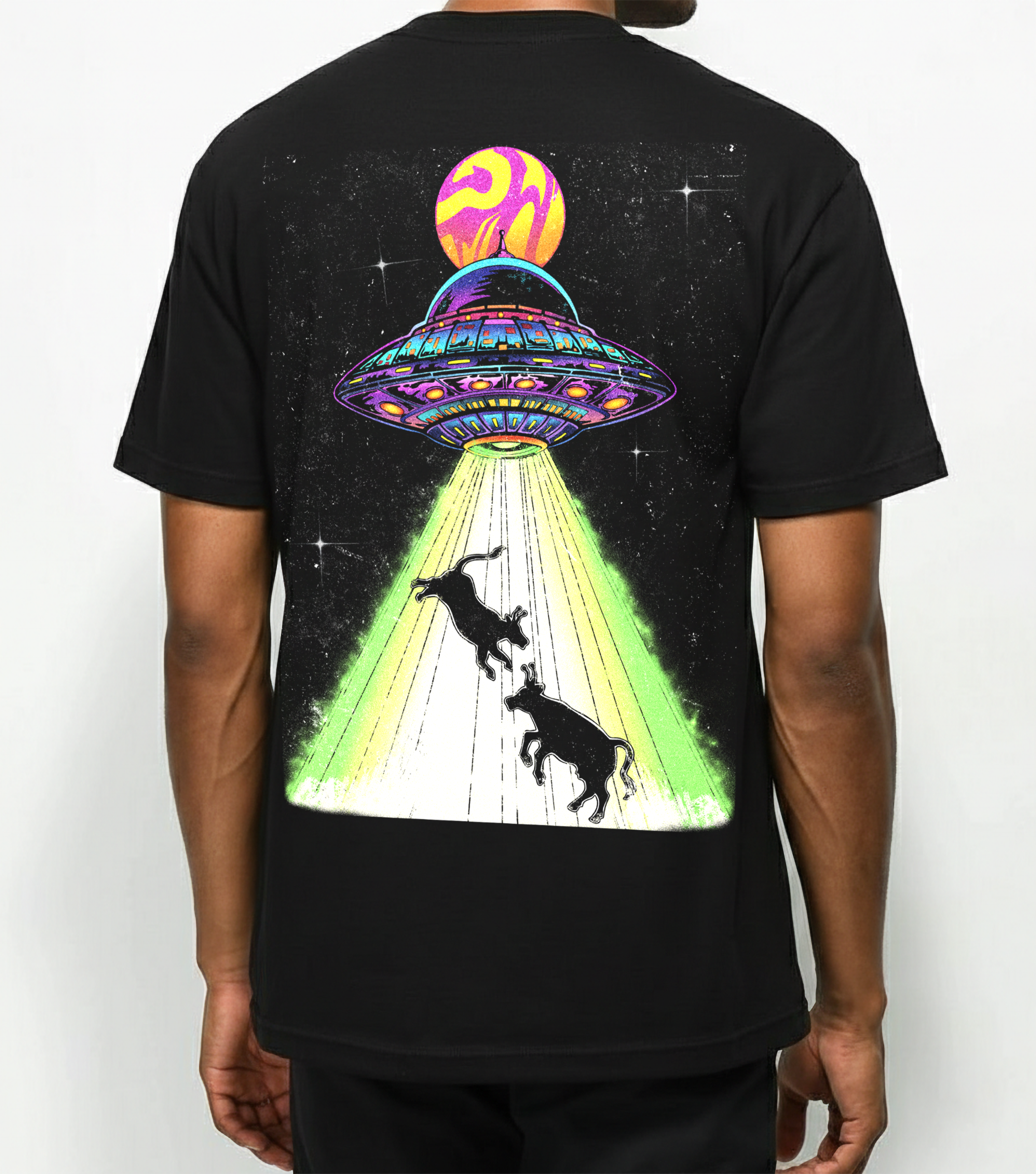 Black t-shirt with a colorful UFO graphic on the back, featuring two animals being abducted.